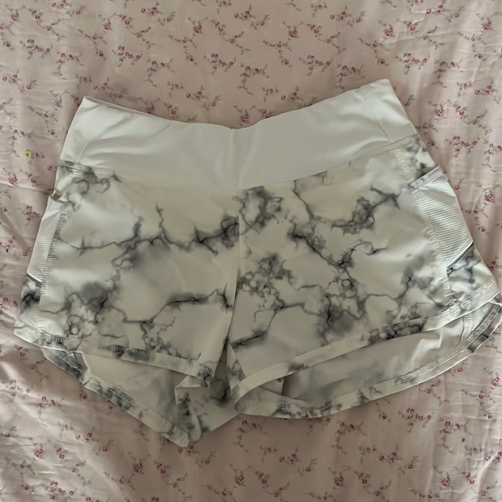 White marble running shorts